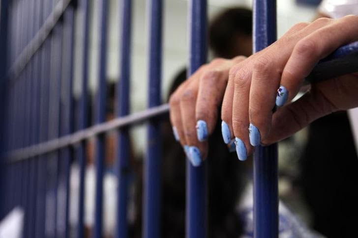 The painted fingernails of an inmate of the Women's Prison of Brasilia is seen during preparations for the third annual beauty pageant titled Miss Penitentiary, in Brasilia August 3, 2011. A modelling agency selected 12 finalists out of the nearly 100 women who entered the competition. REUTERS/Ueslei Marcelino (BRAZIL - Tags: CRIME LAW SOCIETY)