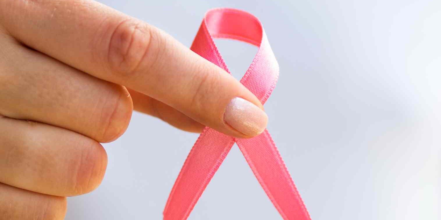 close-up-person-holding-awareness-ribbon (2) (1)